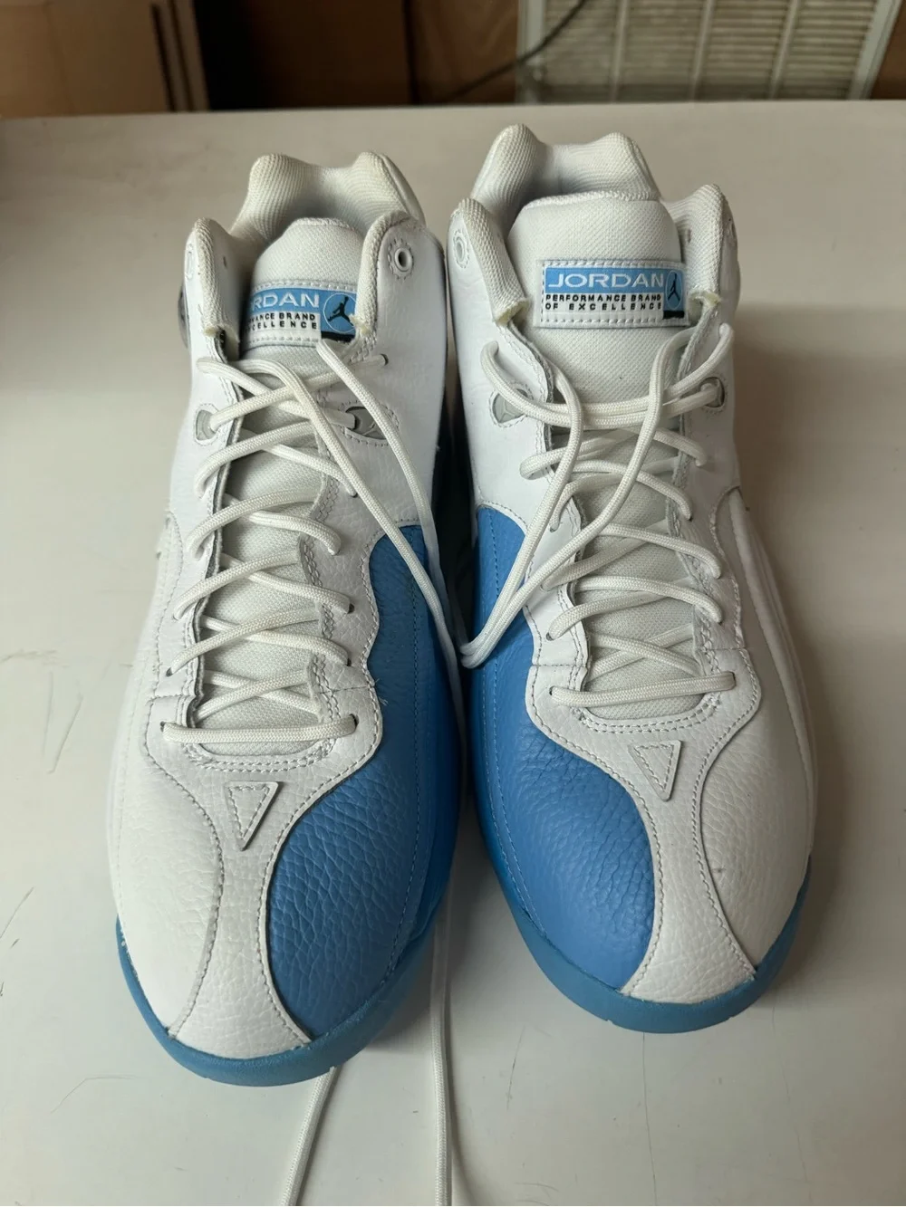 Jordan Mens 10 White and Light Blue High-Top Basketball Sneakers